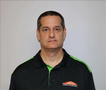 Phillip Amaral Lead Technician at SERVPRO of Bartow County - male employee in front of white wall